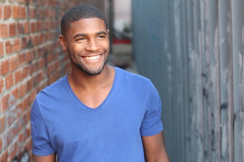 man smiling with bright and straight smile