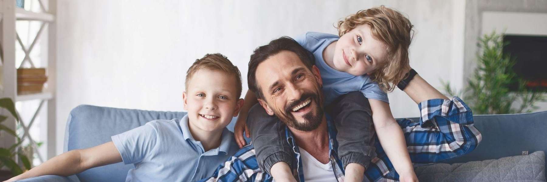 A picture of a family smiling after visiting Casuarina Square Dental Care