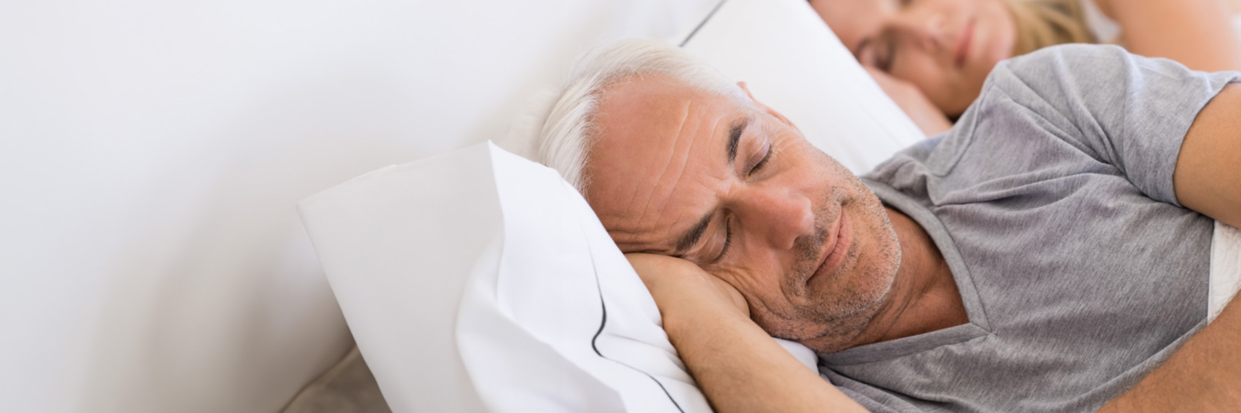 A couple sleeping peacefully after a Continuous Open Airway Therapy in Casuarina, NT