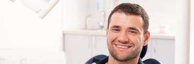 darwin man smiling in dental chair